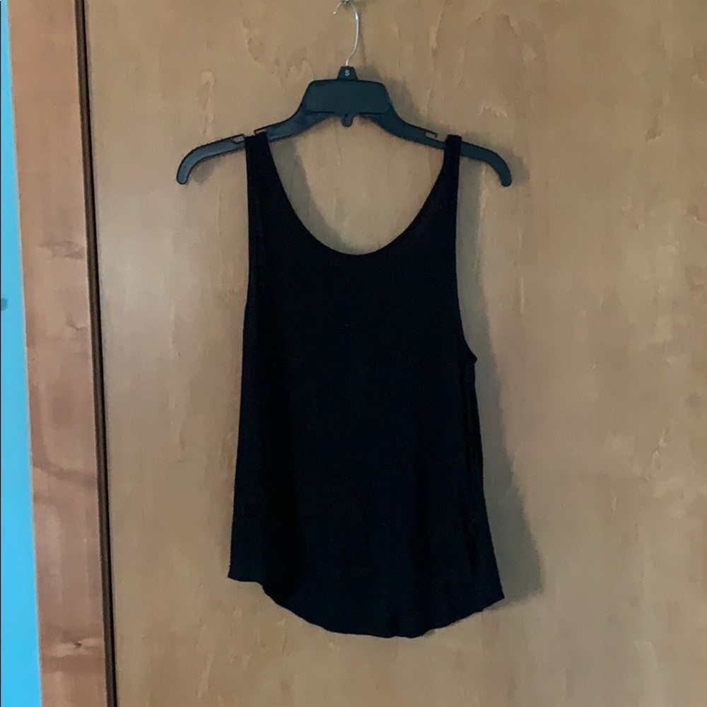 Blank tank top with cross on back
